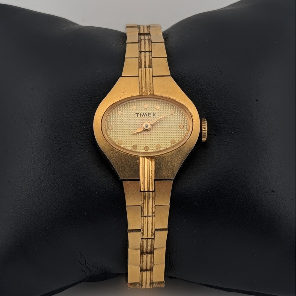 Vintage Timex Manual Wind Textured Dial Gold Tone Oval Bracelet Watch